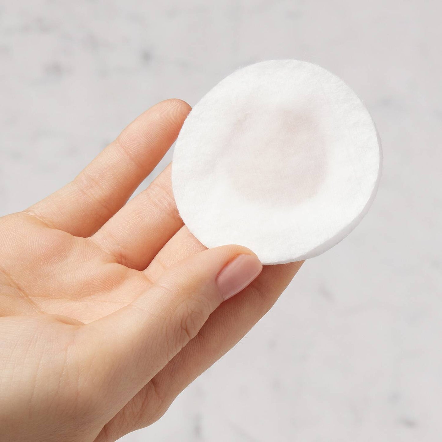 Kiehl's Daily Refining Milk-Peel Toner 200ml on cotton pad for glowing skin