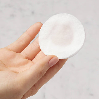 Kiehl's Daily Refining Milk-Peel Toner 200ml on cotton pad for glowing skin