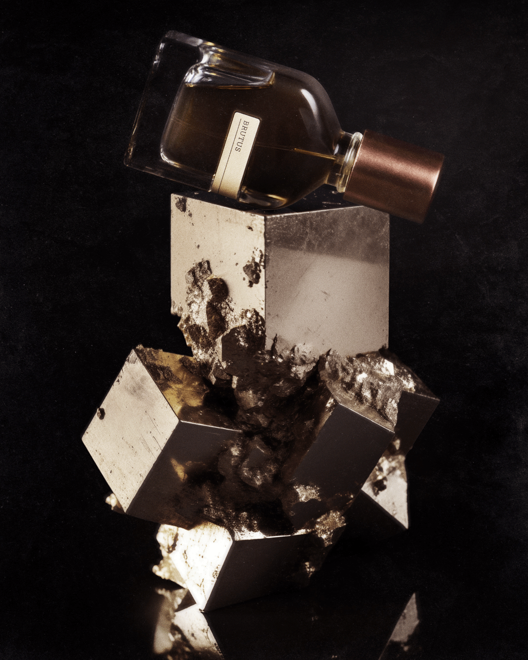BRUTUS perfume bottle showcasing timeless beauty and elegance.