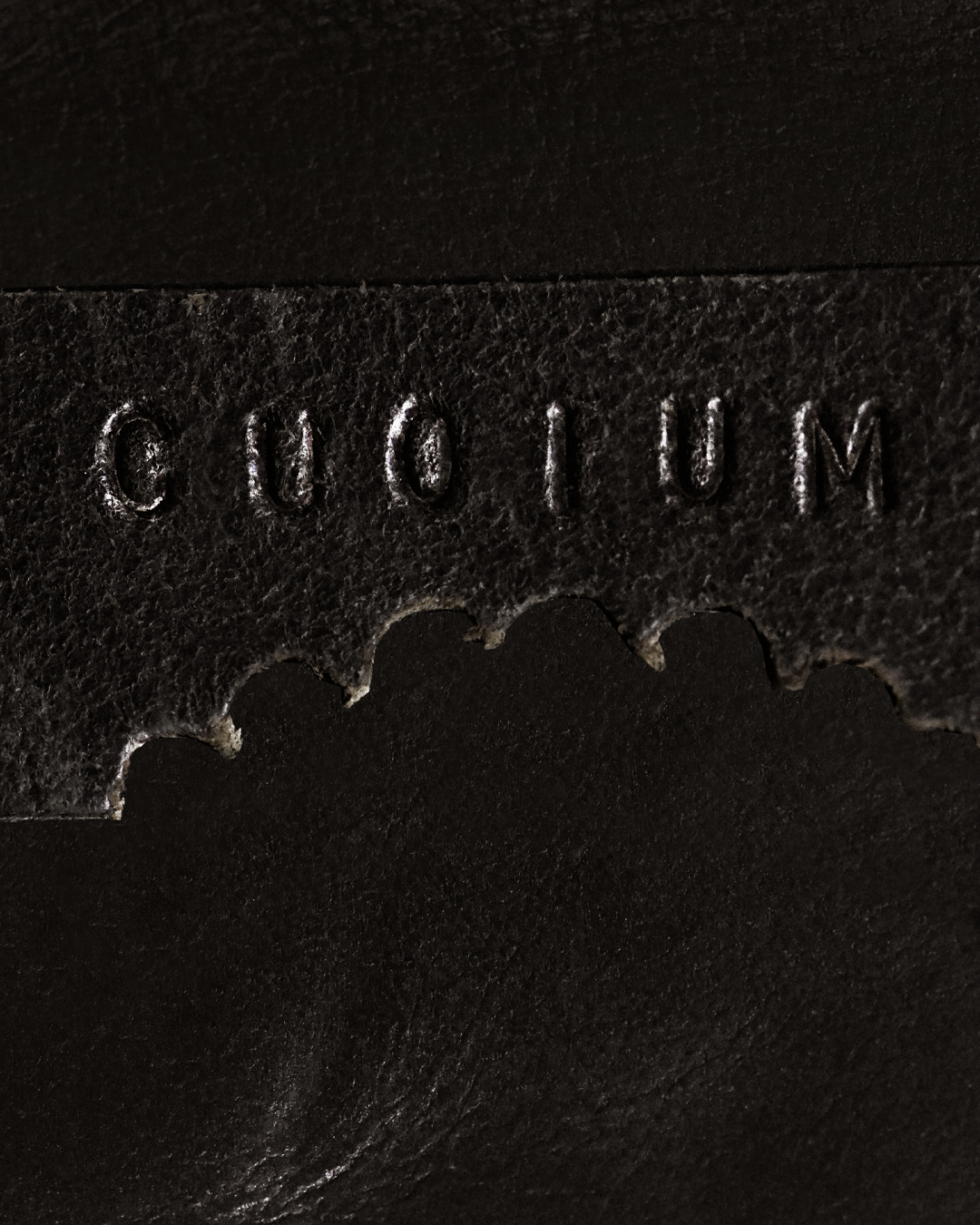 CUOIUM leather logo, showcasing love for natural materials.