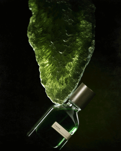 VIRIDE perfume bottle promoting glowing skin and hydration.