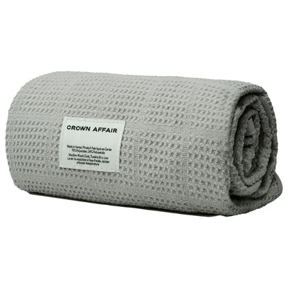 The Hair Towel, a waffle-knit towel for reducing hair-drying time.